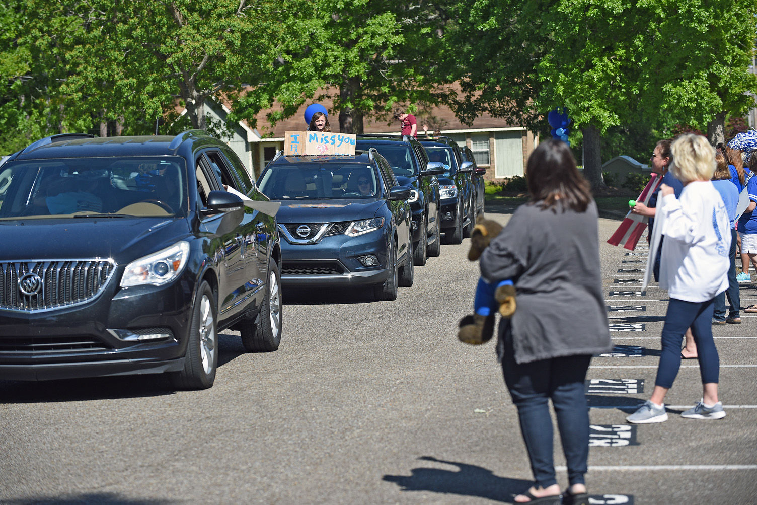 Teachers hold parade for students at Houston Academy